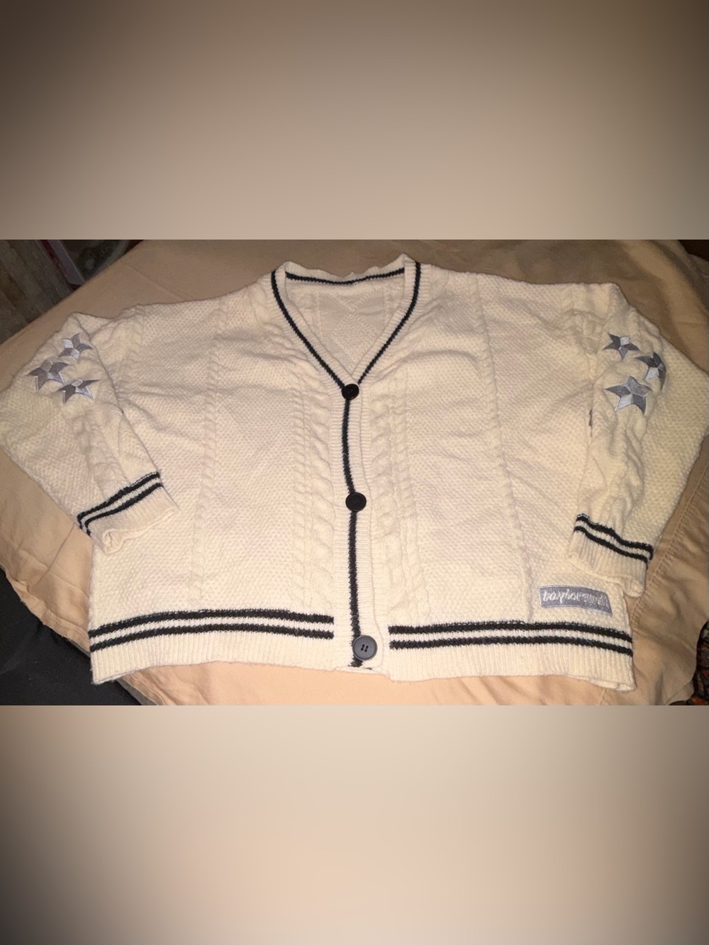 Taylor Swift Cream Cardigan with navy Trim and Star Details